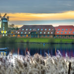 A,Panoramic,Picture,Of,The,Windmill,At,Caldecotte,Lake,In